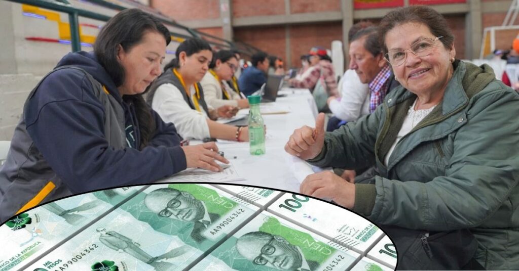 Adulto mayor recibiendo su pago del programa Colombia Mayor